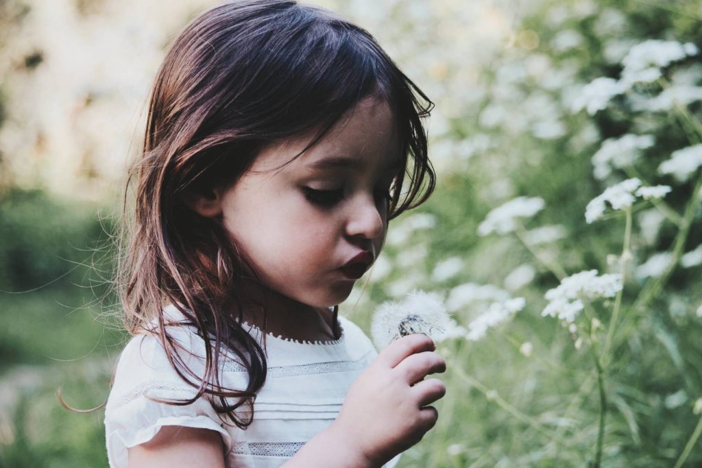 Girl with dandelion